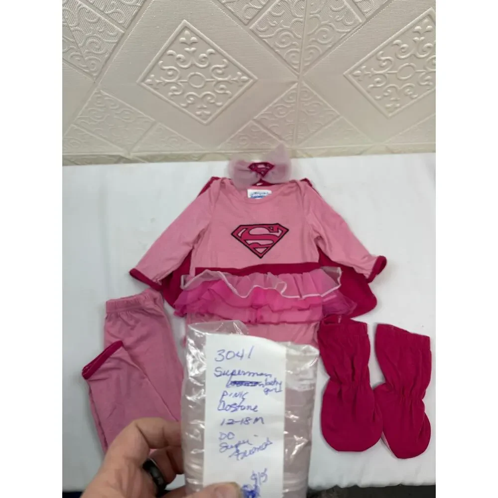 SKU3041 Rubie's Costume Baby DC Super Friends Supergirl 6-Piece Pink  12-18 Mts